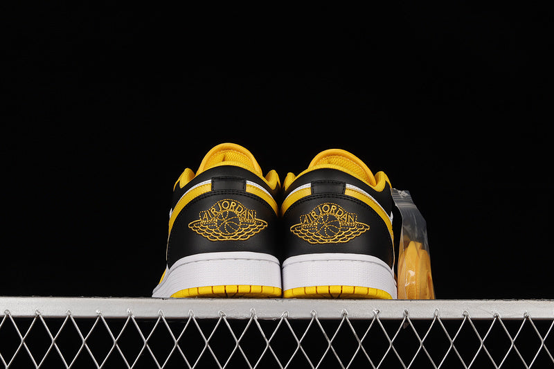 Jordan 1 Low Gs "University Gold White-Black"